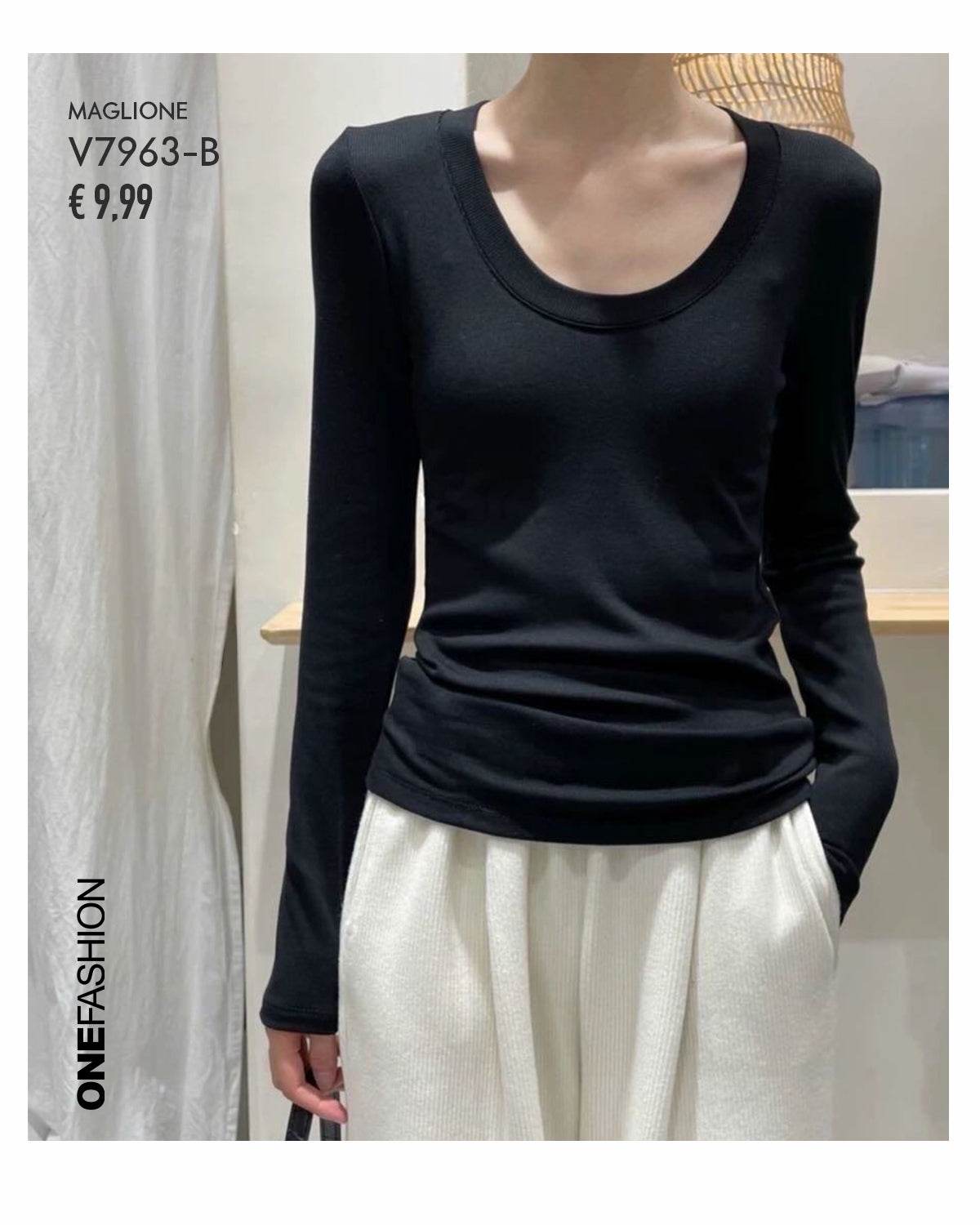 MAGLIA NERA A COSTINE